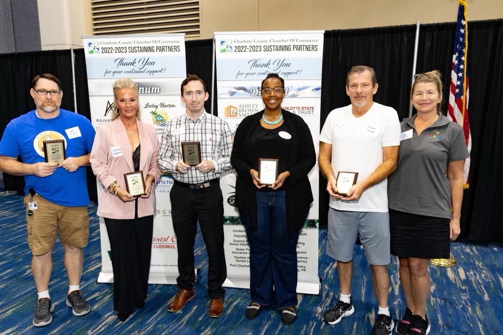 picture of lisa motteler aprn gathered with other new punta gorda chamber of commerce members