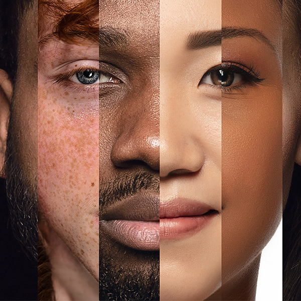 a picture of a face comprised of slices of different people's faces of differing ethinicities and genders to make up one image of a face